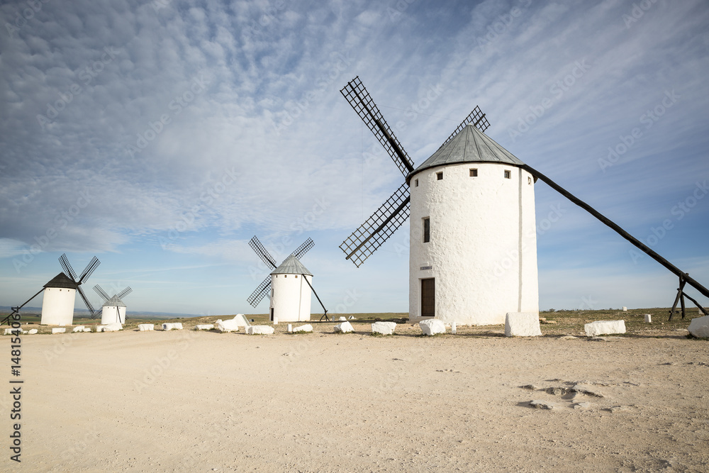 white windmills in Campo de Criptana town, province of Ciudad Real, Castilla-La Mancha, Spain