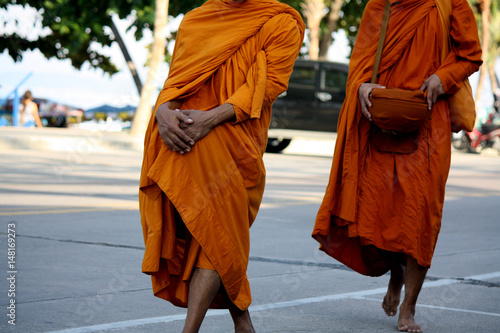 Buddhist monks walking for receive food from the people 