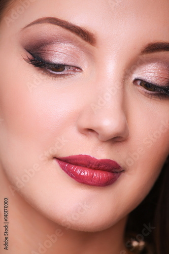 Close up portrait of beautiful young woman face