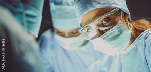 Team surgeon at work on operating in hospital