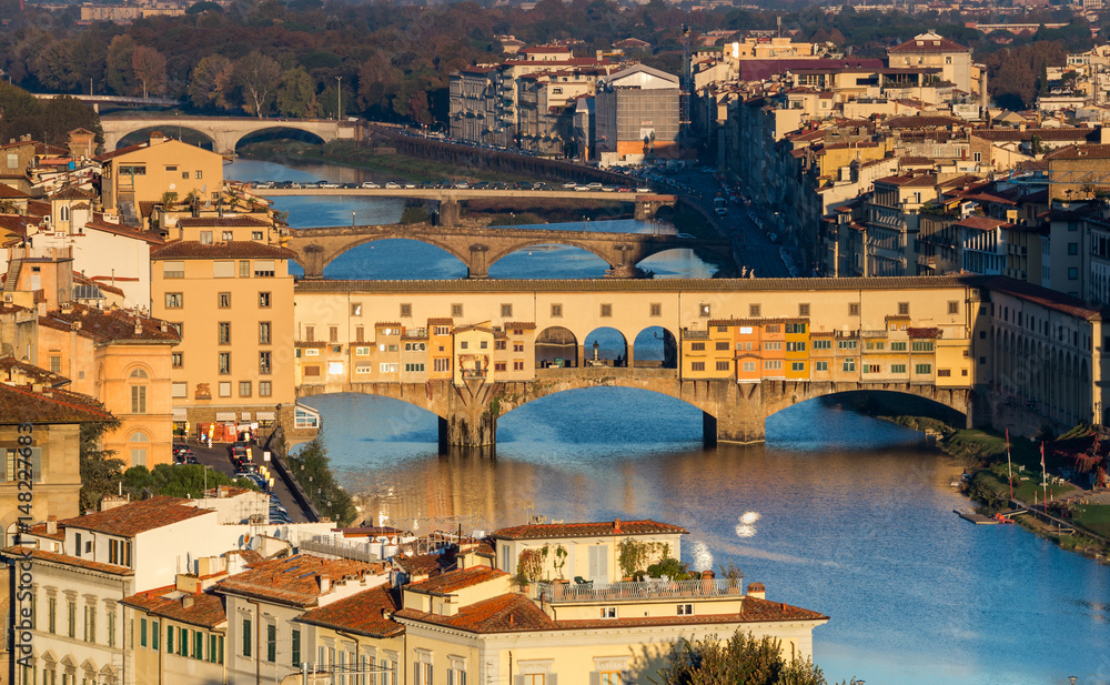 Dawn view of the Arno river and Ponte Vecchio bridge in Florence