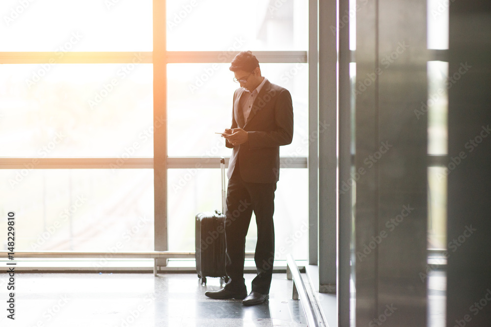 indian male walking at airport