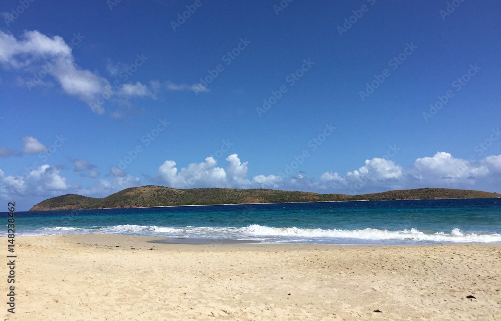 Pristine Zoni Beach in Culebra Island boats of clear blue waters and picturesque views.