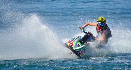 Acrylglasbilder Wasser Motorsport Jetski-Wettkampf mit spritzender Gischt  © harlequin9