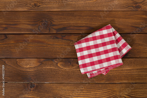 Background with empty wooden table with tablecloth