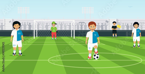 Children's football team with a cheering backdrop in the stadium.