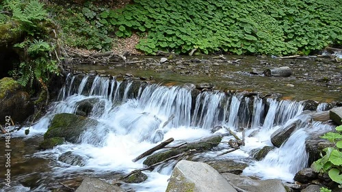 Video of a small waterfall in the mountains.
