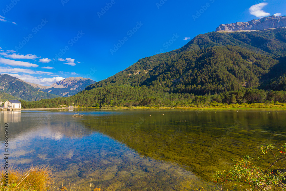 Beautiful lake between mountains with reflections in the water