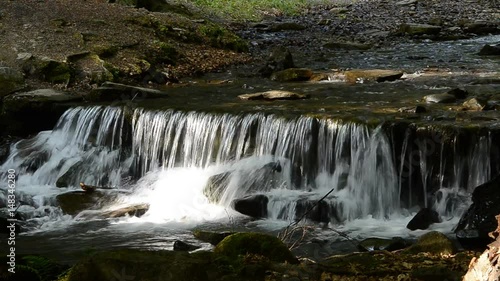 Video of a small waterfall in the mountains.