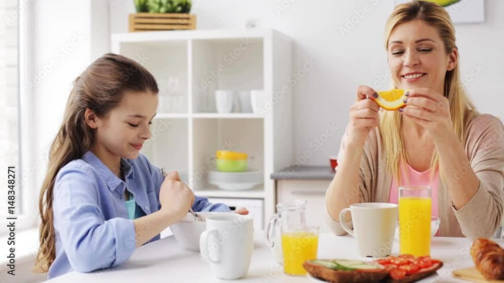 happy family having breakfast at home kitchen happy family having breakfast at home kitchen