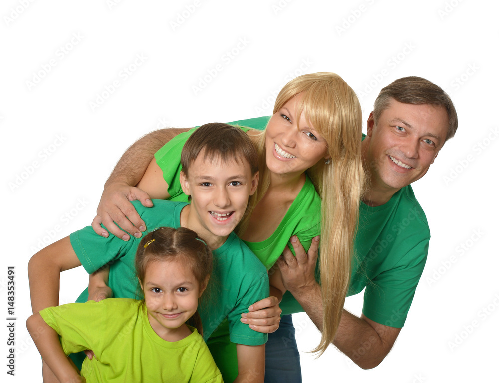Happy family with young children on a white background