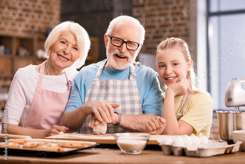 family kneading dough