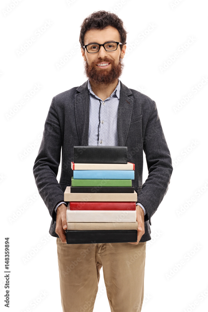 Professor with a stack of books looking at the camera Professor with a stack of books looking at the camera