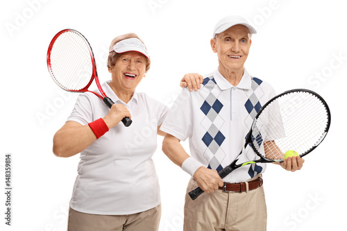 Elderly tennis players looking at the camera and smiling © Ljupco Smokovski