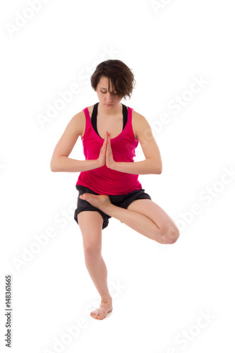young female doing yoga exercise