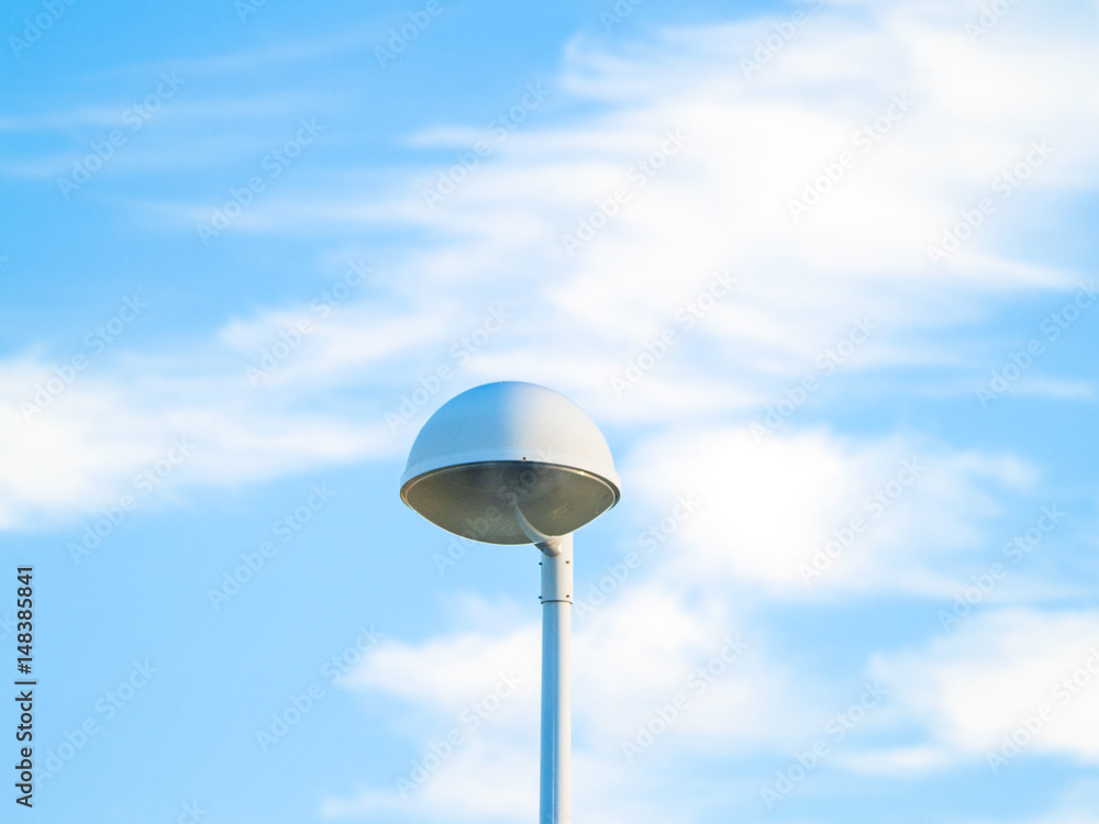 Street lights on a cloudy day on and urban landscape Street lights on a cloudy day on and urban landscape