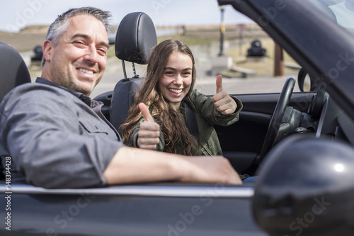 Teen learning to drive or taking driving test. © Louis-Photo