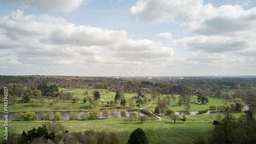 Brocket Hall golf course, Hertfordshire, England. Aerial drone view of the landscaped countryside near Welwyn Garden City on a bright spring day.