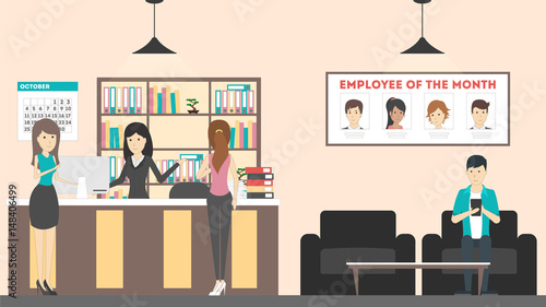 Reception at office. Visitors talk with receptionist.
