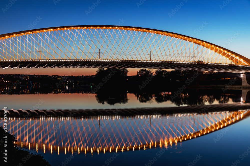 Fototapeta premium Troja bridge Prague over the Vltava river in the night with illumination. Trojsky most . Czech Republic