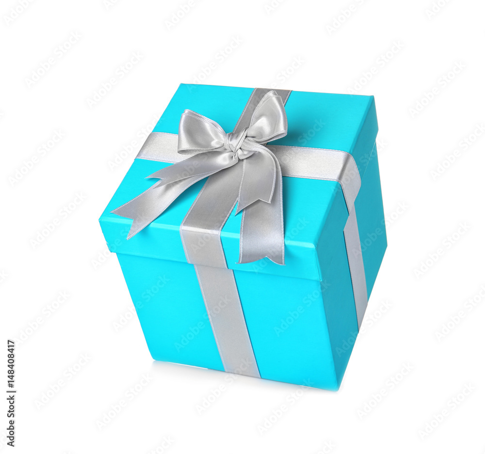 Beautiful turquoise gift box with silver ribbon on white background Beautiful turquoise gift box with silver ribbon on white background