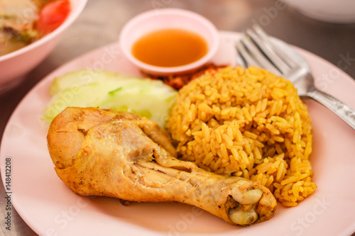 Muslim yellow jasmine rice with chicken (Khao mok kai).