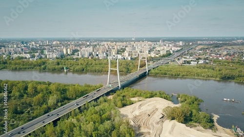 Aerial shot of Warsaw residential area, Vistula river and guyed bridge