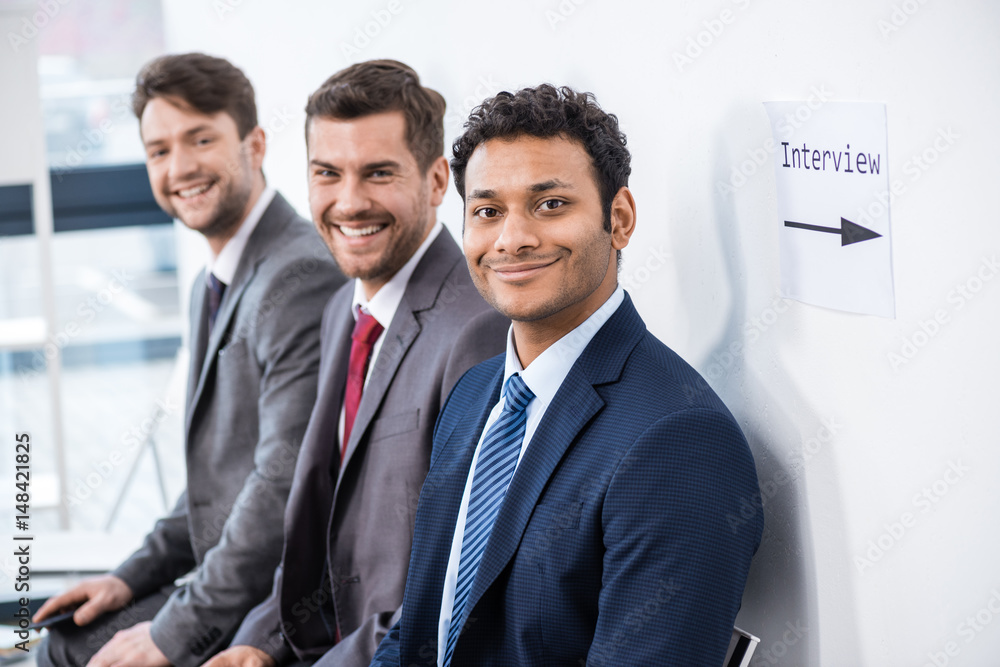 businessmen sitting in queue and waiting for interview in office, business concept businessmen sitting in queue and waiting for interview in office, business concept