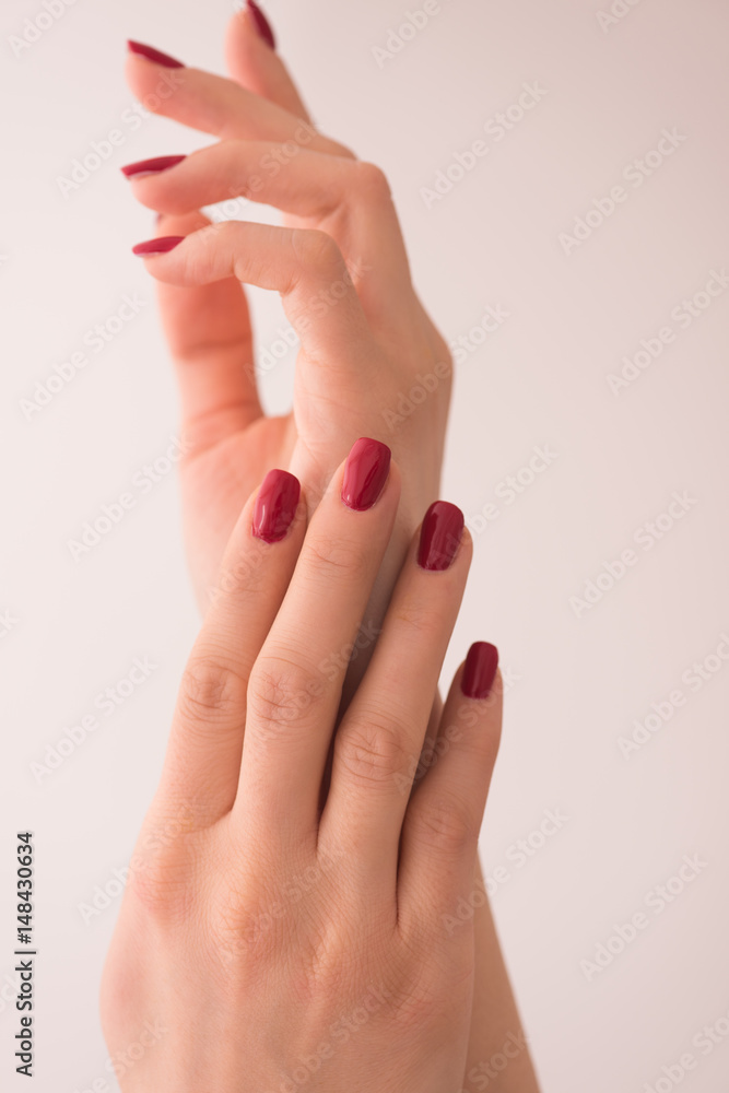 closeup of hands of a young woman closeup of hands of a young woman