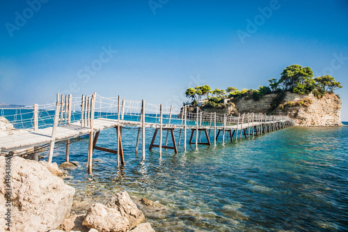 Greece, Zakynthos, wooden Bridge to the small island Agios Sostris, to the cliffs