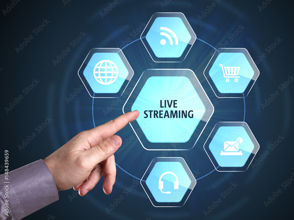 Business, Technology, Internet and network concept. Young businessman shows the word: Live streaming Business, Technology, Internet and network concept. Young businessman shows the word: Live streaming