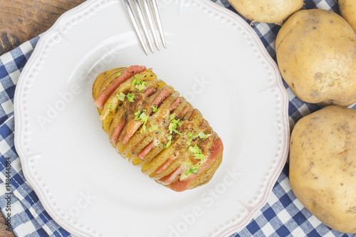 Baked potato with cheese and butter