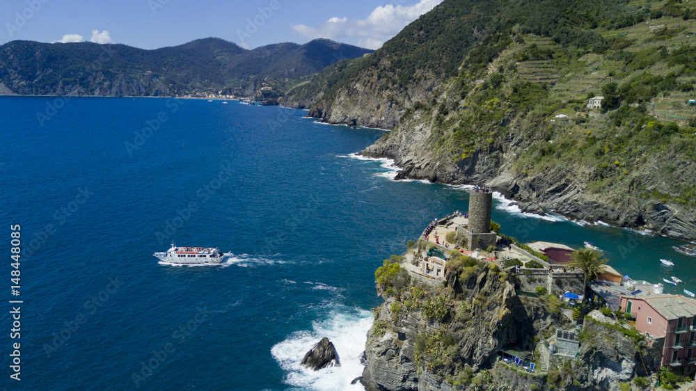 Aerial photo with drone on Vernazza, one of the famous Cinqueterre country, small village with colored houses on the cliff over the sea