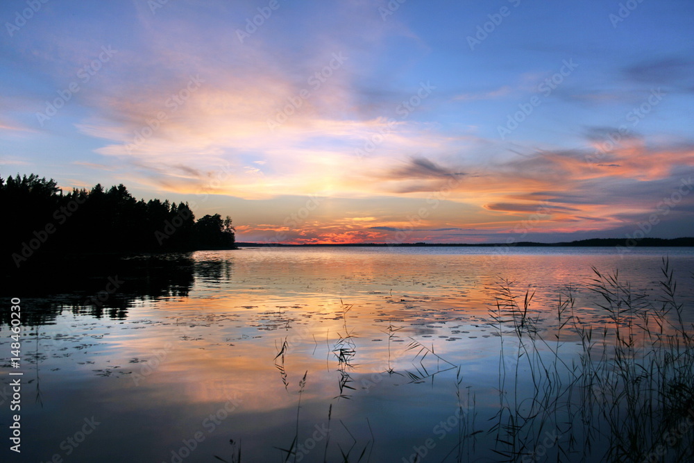 Beautiful sunset on lake. Karelia