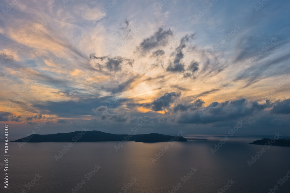 Cloudscape over Santorini island at sunset, Greece