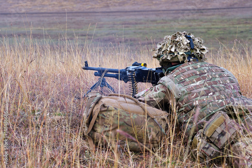 US Marines with semiautomatic rifle on the firing line in Romanian military polygon in the exercise Smardan Danube Express 14  photo