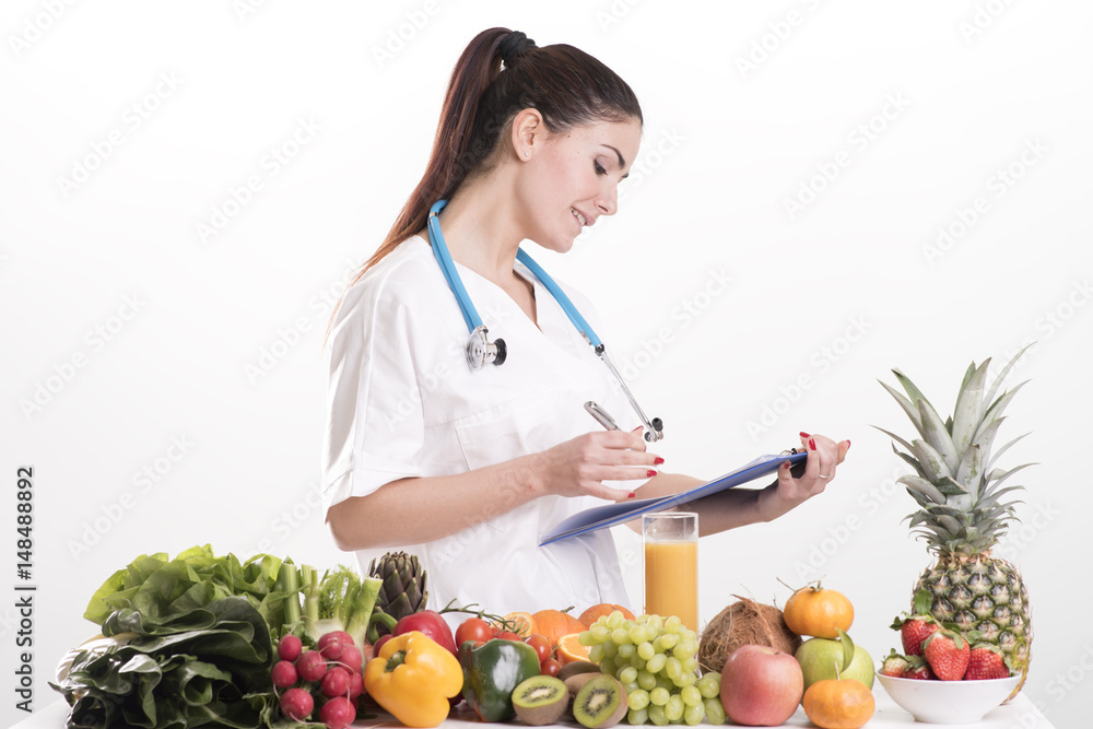 Female dietitian in uniform with stethoscope Female dietitian in uniform with stethoscope