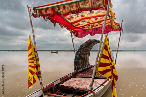 Boat waiting for passenger river teesta  photo