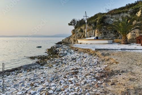 Sunset view on embankmen in Thassos town, East Macedonia and Thrace, Greece  photo