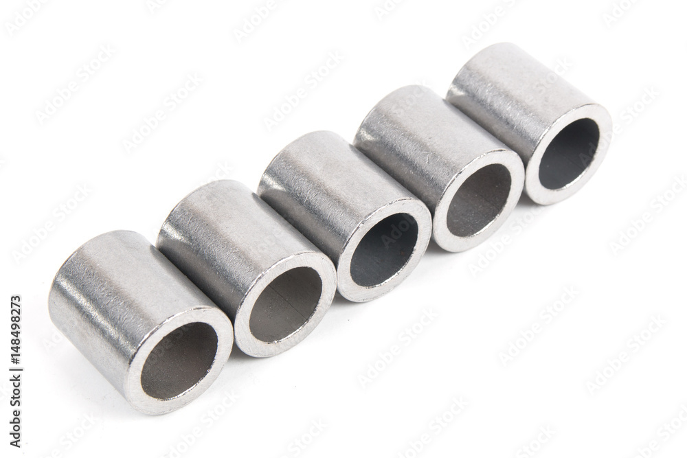 Metalworking technologies. Metal steel cylinders on a white background.