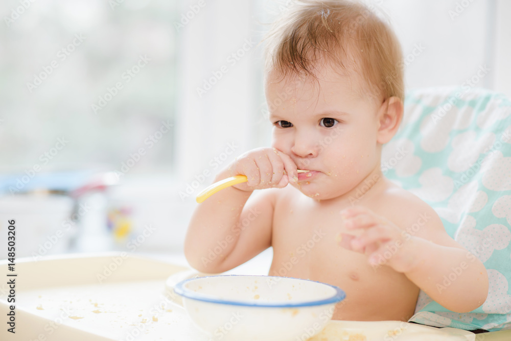 The child in the kitchen ate porridge The child in the kitchen ate porridge