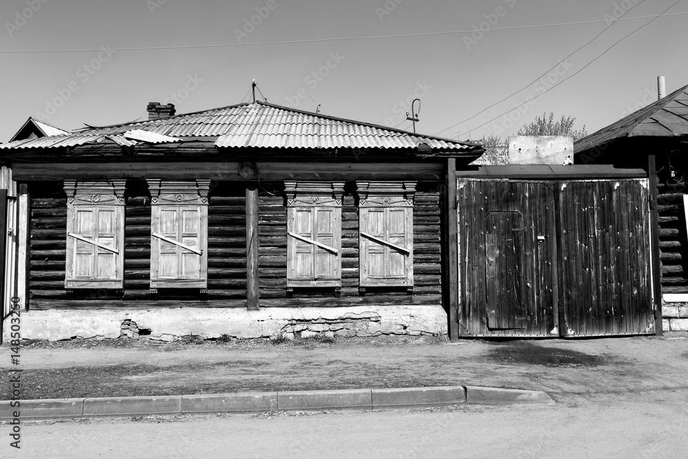 Ancient wooden house in black and white tones Ancient wooden house in black and white tones