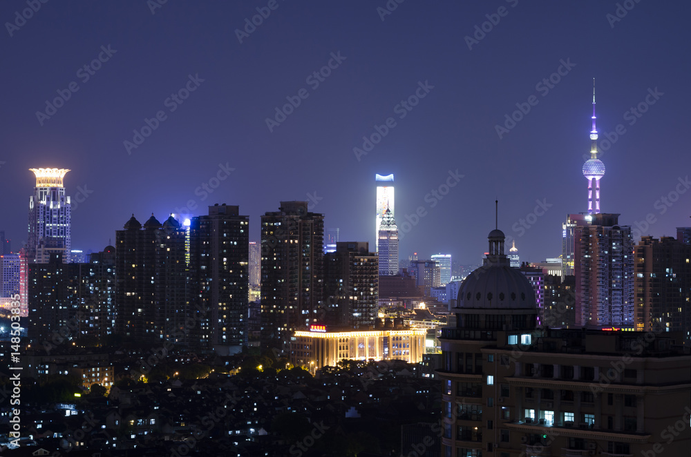 Beautiful bright night scape lights and clear sky view of Shanghai's downtown skyline. Pudong district, Shanghai China, Asia.