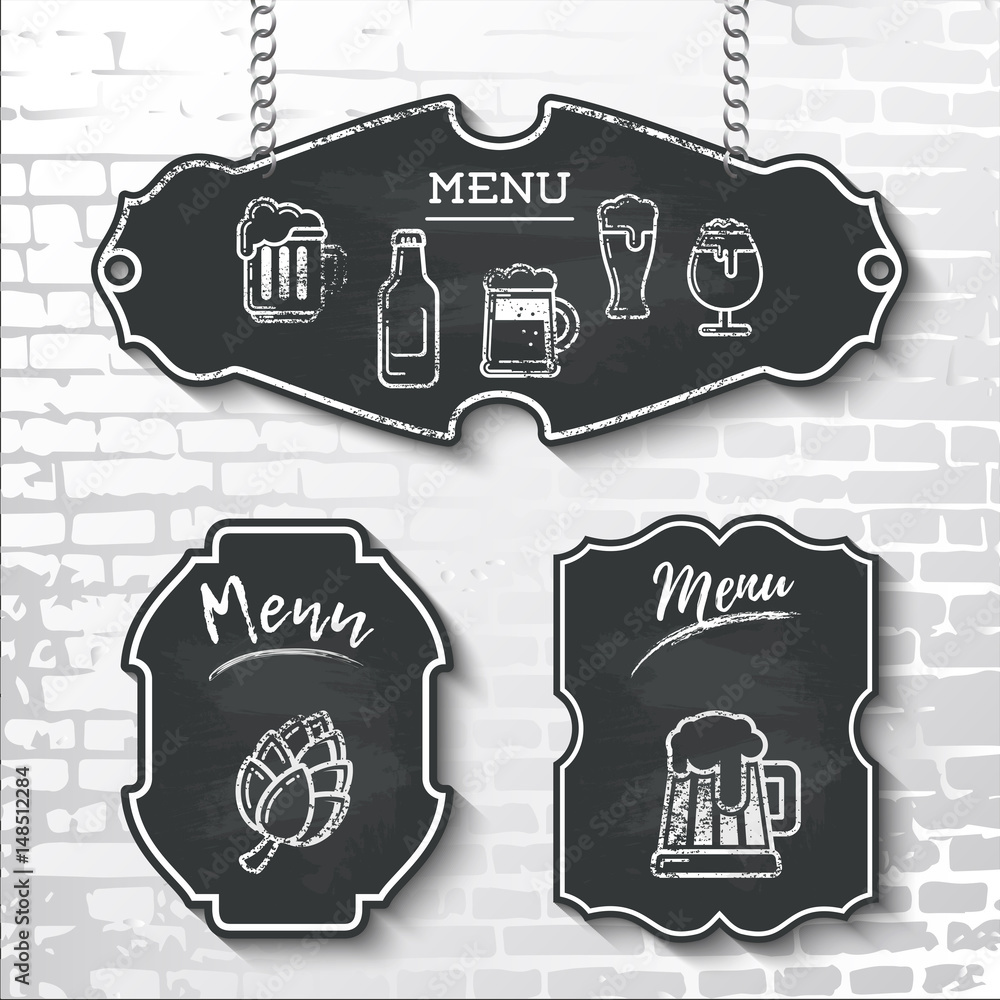 Menu with vector beer icons drawn in chalk on a black chalkboard hanging on  a brick