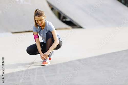 Young woman having exercise outdoors