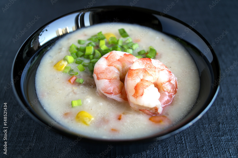 soup with sea food on black background soup with sea food on black background