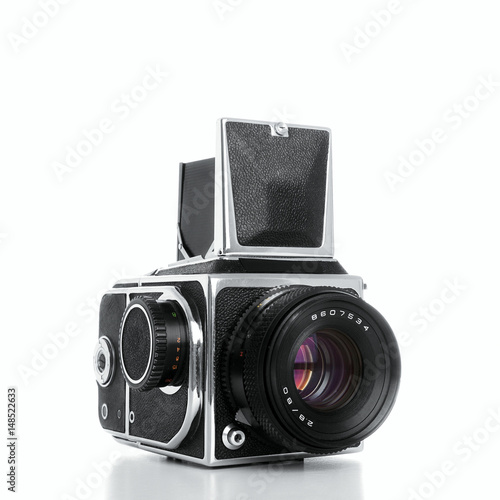 Medium format film camera isolated on white background.