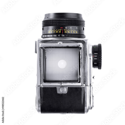 Medium format film camera isolated on white background. Top view.