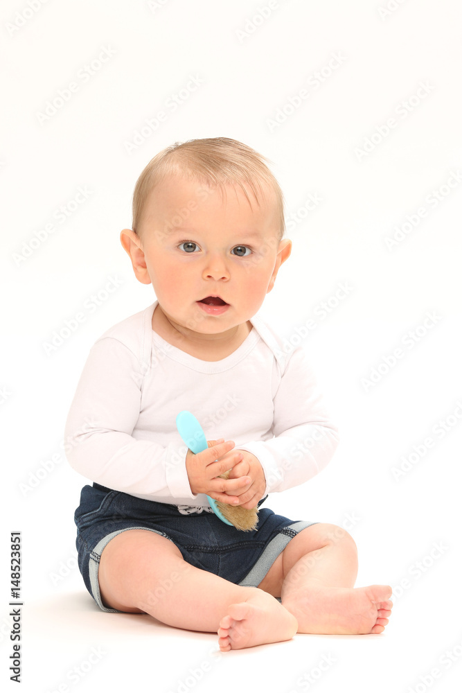 Baby brushes hair and eats hair brush Baby brushes hair and eats hair brush