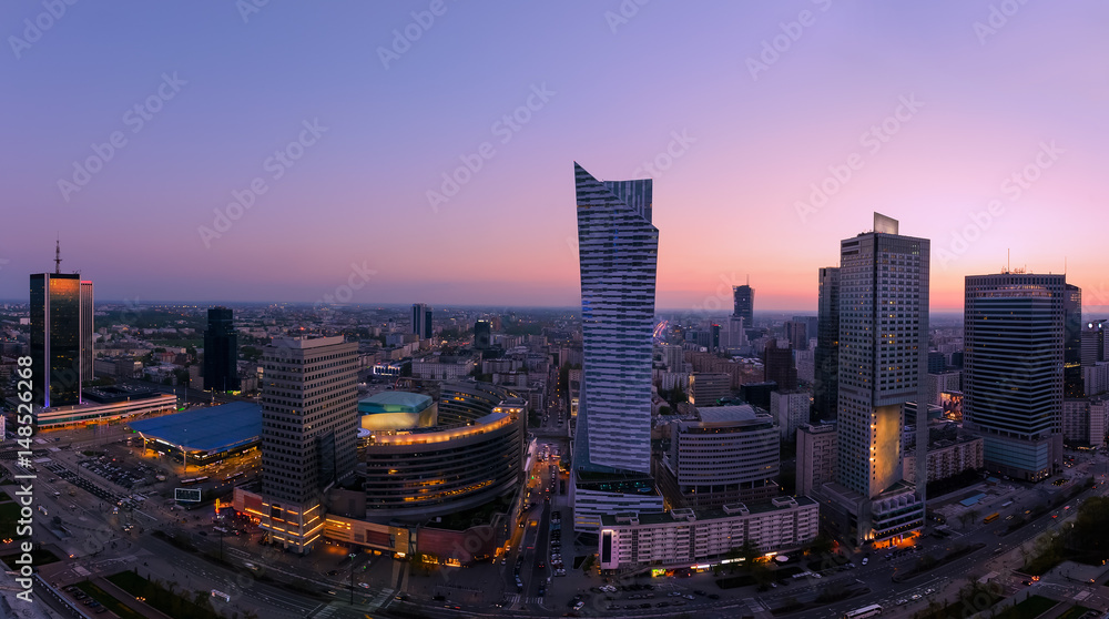Panorama of Warsaw city with modern skyscraper after sunset